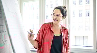 Woman looking at calculations